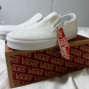 White checkered slip on vans